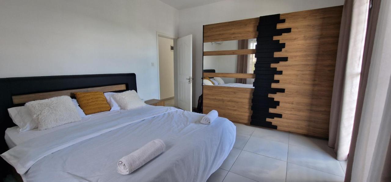 Modern bedroom at Luxora Villa Pereybere